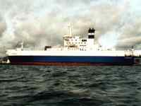 small kayak in front of bigger ship